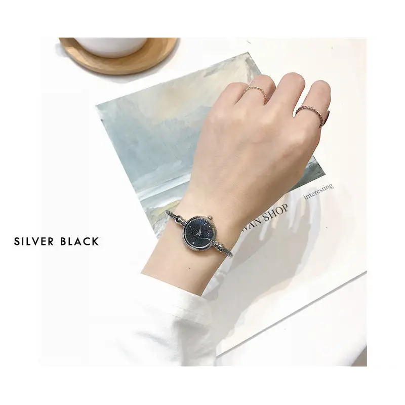 außergewöhnliche Sternen Armreif Uhr Damenuhr elegant Silber