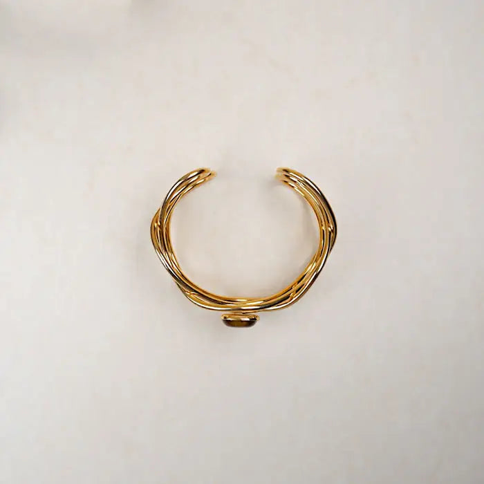 breiter Armreif mit Stein-Amani-geschwungene Armspange Gold