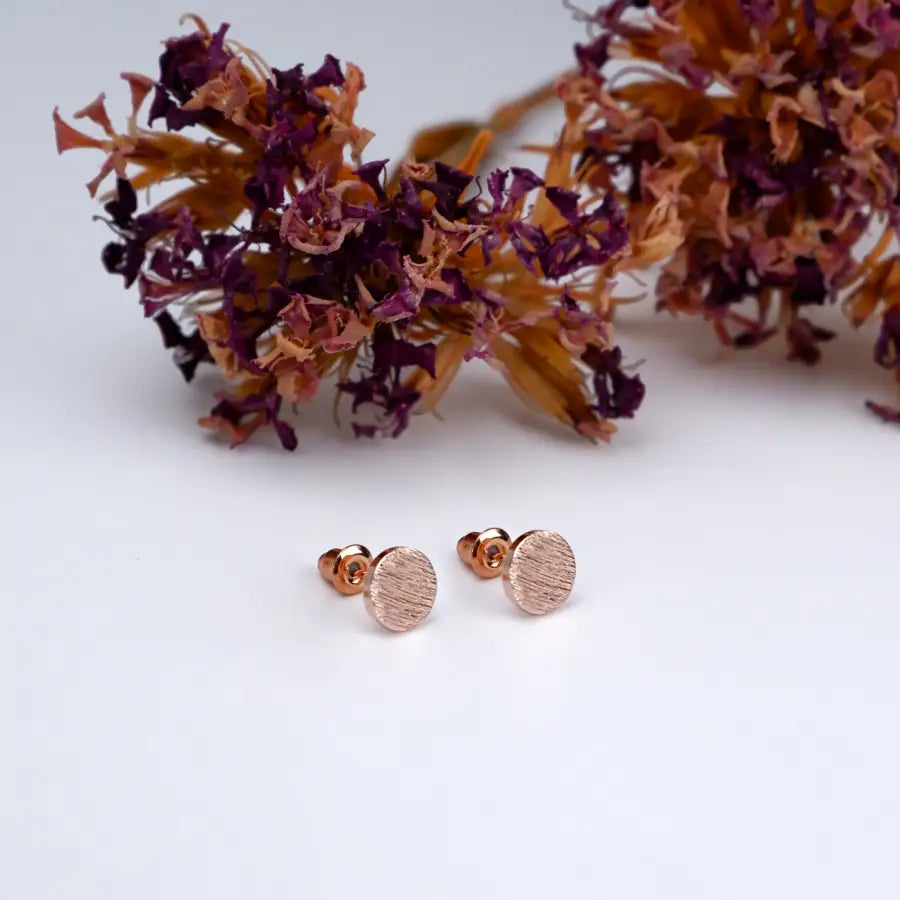 Runde deinen eleganten Stil mit unseren Kreis Ohrsteckern ab!