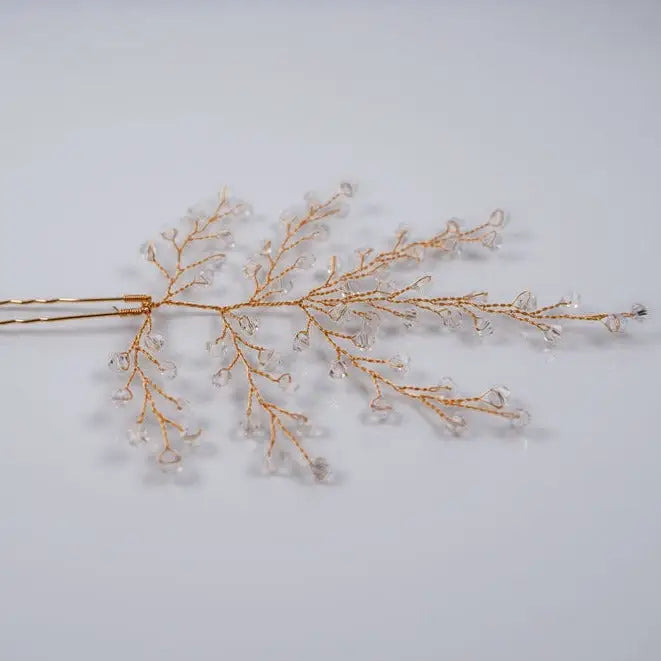 feiner goldfarbener Zweig-Haarschmuck