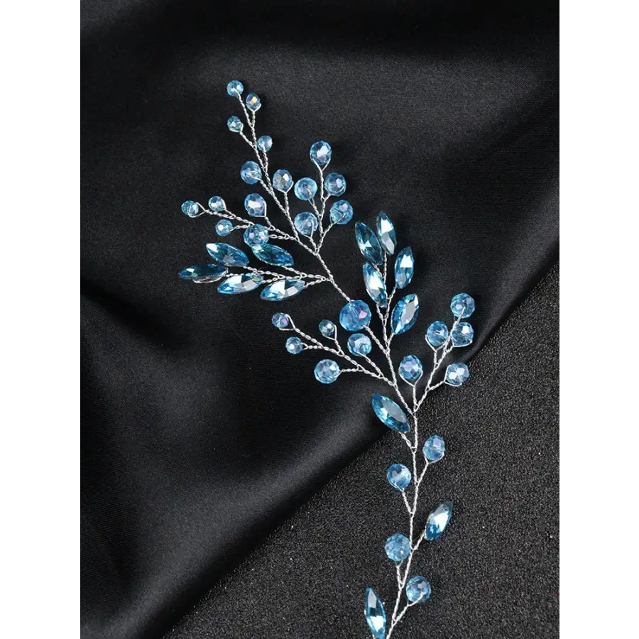 Haarranke mit blau leuchtenden Perlen und Strass-für