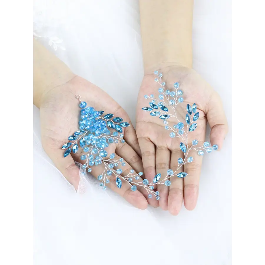 Haarranke mit blau leuchtenden Perlen und Strass-für
